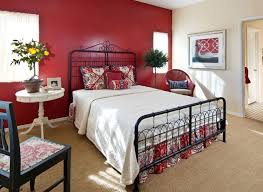 A colorful accent wall is a great way to create a fresh new look for a room. How To Decorate A Bedroom With Red Walls