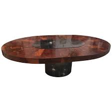 This dining table can accommodate 4 to 6 people, is a great dining furniture that can bring friends and family together. Paul Evans Burl Wood Cityscape Starburst Dining Table Brushed Steel Chrome Florida Regency