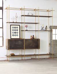 Shelves, standards (long vertical slotted strips fastened to the wall), and brackets that fit into grooves along the length of the standards. The Collector S Shelving System By Amuneal Yellowtrace Shelving Shelving Systems Interior Furniture