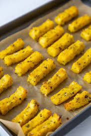 Polenta fries have a crispy outside yet creamy inside and are baked not fried. Vegan Baked Herbed Polenta Fries Veganosity