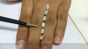 marquise shape diamonds size comparison on hand