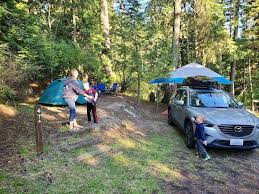 Three separate campsites located at the northern, central, and southern shores of cascade lake can accommodate visiting parties of numerous shapes and sizes; Midway Campground At Moran State Park Orcas Island Washington