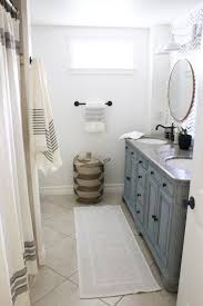 See more ideas about guest bath, bathroom wall lights, bathroom faucets. Crisp White Vanity Lights Star In Updated Bathroom Inspiration Barn Light Electric