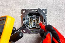 How do you test a wall outlet with a multimeter? Measuring The Readings Of An Electrical Outlet With A Multimeter Stock Photo Picture And Royalty Free Image Image 159473568