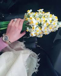 image may contain 1 person girls with flowers flower beauty narcissus flower