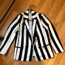 I have been looking for a black and white verticle stripe beetlejuice blazer for a while and haven't been able to find one. Jackets Coats Black And White Striped Blazer Beetlejuice Poshmark