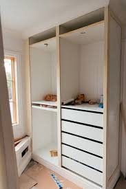 Jaw Dropping Transformation Of Ikea Pax Into A Walk In Closet Ikea Wardrobe Build A Closet Ikea Closet Hack