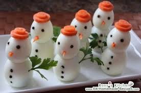 Kids will love this fun christmas food idea! Eggs With Carrot Hat Snowmen Healthy Christmas Treats Best Christmas Appetizers Healthy Christmas Snacks