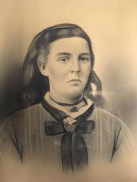 This is a circa 1910 photo of Elizabeth Estes from the Westhoff Photo  Collection held by the Boone County Historical Society. Elizabeth is  dressed as "Columbia" with a flag and dress and