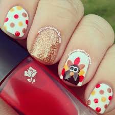The nails have been inspired by the fall. Fun And Easy Thanksgiving Day Nail Art Ideas