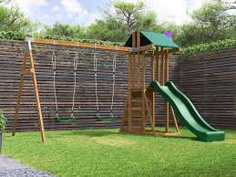 Large playhouse made of wood and plastic. 8 Vital Things To Consider Before Buying A Playhouse With Slide Foter