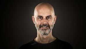 Bald guy still into hair metal