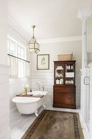 The national electric code (nec) from 2011 requires that any part of a light fixture, including crystals dangling from chandeliers, must be a minimum of 8 feet above the highest portion of a tub's walls. 4 Bathroom Lights Tips And 25 Examples Digsdigs