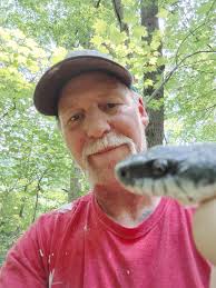 Edit* Thanks everyone! This was confirmed to be over 6' long (probably  close to 7') looks like a regular black rat snake but I didn't think they  could get that big??