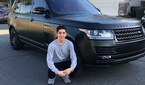 Delightful Who Is Faze Rug Pics Best Of Who Is Faze Rug For Faze Rug Crouching Besides The Front Wheel Of His Range Rover 18 Range Rover Car Range Rover Black