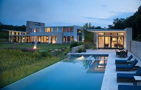 Contemporary pool house with curved shapes. Pools Pool Houses Photo Gallery Bowa Design Build Renovations