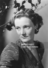 US film actor Gary Cooper with William Anderson, head of the... News Photo 