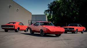 Which Red Rare Restored 1969 Dodge Charger Would You Buy Dodge charger grey red and black with 1300hp v10 twin turbo 68 charger built by the roadster shop.