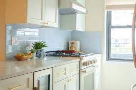 Sky Blue Subway Tiles With White Shaker Cabinets Transitional Kitchen