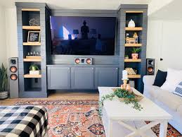 A simple approach would be to remove the door frame & trim as you are planning, and then build a veneered 3/4 plywood box that has an opening size to match. Diy Shiplap Builtins With Free Plans Honeybear Lane