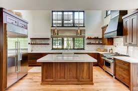 Floating base cabinets were used with a matching wood top to provide storage under the tv for components, games, blankets, etc in this family room. Floating Base Cabinet Ideas Photos Houzz