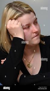 Jane Bowden, the fiancee of murdered father Peter Woodhams, cries during a  news conference at Snow Hill police station, London Stock Photo