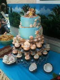 Beach Themed Babyshower Cake And Cupcakes Beach Themed Cakes Baby Shower Cakes Ocean Baby Showers