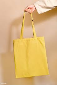Download Woman Holding A Yellow Tote Bag In Her Hand Free Image By Rawpixel Com Jira Yellow Tote Bag Tote Bag Blank Tote Bag