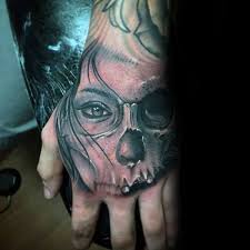 80 Skull Hand Tattoo Designs For Men Manly Ink Ideas Skull Hand Tattoo Hand Tattoos Tattoo Designs Men