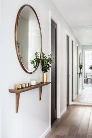 11 Decor Ideas To Make Narrow Hallways Look Bigger Hunker Narrow Hallway Decorating Hallway Decorating Foyer Decorating