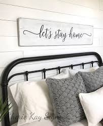 Check spelling or type a new query. Lets Stay Home Farmhouse Bedroom Sign Pictured Above A Queen Size Bed Size 47 X 11 25 Painted Bedroom Art Above Bed Lets Stay Home Master Bedrooms Decor