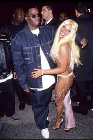 Lil' kim became controversial due to her various plastic surgeries issues, is said to have had breast implants, a brow lift, skin whitening procedures, rhinoplasty, and lip injections to puff up her pout. Diddy And Lil Kim Lil Kim Then And Now Photos Puff Daddy