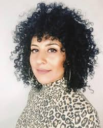 Check out our list of hairstyle inspo below: 21 Best Ways To Have Curly Hair With Bangs In 2021