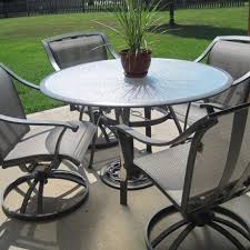 Fascinating Patio Furniture With Round Dining Table And Comfortable Dining Chairs With Cast Iron Patio Furniture Round Patio Table Wrought Iron Patio Furniture