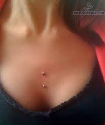 pin by tanja m l on piercings dermal piercing chest piercing piercing tattoo