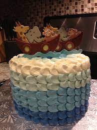 Noah S Ark Baby Shower Cake Blue Petal Ruffle Cake Tutorial Originally Found On Cake Centr Animal Baby Shower Cake Baby Shower Cakes Unique Baby Shower Cakes