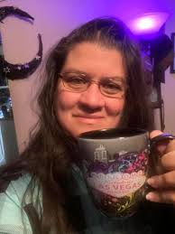 Angel baby in a backpack at our neighborhood coffee shop today 🥰❤️