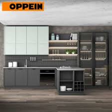 The choice of most popular kitchen cabinet colors in 2020 depends on what kind of kitchen you would like to see after finishing all the work. China Oppein Bespoke Color Combination Dark Grey Kitchen Cabinets Design China Grey Kitchen Cabinets Color Combination Kitchen