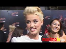 Her body is shown when jon foster visits amber lying on the beach. Amber Heard Interview Zombieland Premiere Youtube