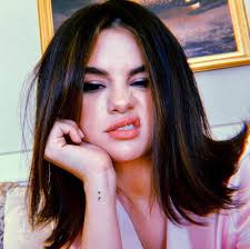 20 selena gomez's third tattoo: Healed Semicolon Tattoo On Selena Gomez