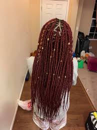 This hairstyle is so mesmerizing. Angelic Touch Medium Burgundy Triangle Box Braids Facebook