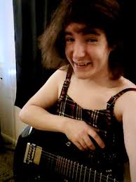 Misha playing with favorite dinosaur toy