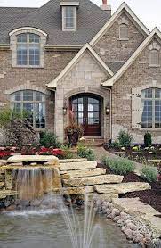 Top 50 Best Brick And Stone Exterior Ideas Cladding Designs Brick Exterior House House Exterior Stone And Brick House Exterior