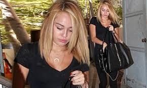 There's a chance hershberger used some extensions on cyrus for added length — another factor that makes the hair look so similar to her old character's. Miley Cyrus Lets Her Blonde Hair Down To Debut New Razor Haircut Daily Mail Online
