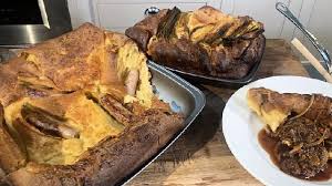 Toad in the hole or sausage toad is a traditional english dish consisting of sausages in yorkshire pudding batter, usually served with onion gravy and vegetables. James Martin S Toad In The Hole With Onion Gravy This Morning