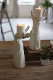 17 Diy Candle Holders Ideas That Can Beautify Your Room Enthusiasthome Hand Candle Ceramic Candle Holders Diy Candle Holders
