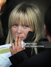 Lyndsey Simpson the mother of five-year-old Ellie Lawrenson looks on...  News Photo