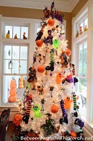 Frightfully Fun Tablescapes For Halloween Halloween Christmas Tree Halloween Christmas Halloween Trees