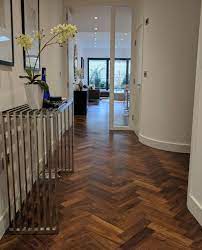.floor, chevron tile floor, zig zag floor cut tile, chevron floor cut tile, chevron tile pattern, how to make a tile chevron floor pattern, zig zag tile floor pattern. The Staggered Zig Zag Pattern Of The Herringbone Design Leads The Eye From The Hall Into The Adj Herringbone Wood Floor Wood Floor Design Wood Parquet Flooring