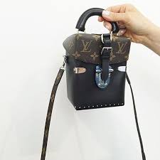 Louis vuitton round zipped coin pouch/purse nwt $550 $1,000 size: A Closer Look Louis Vuitton Reversed Monogram Camera Box Bag Bragmybag